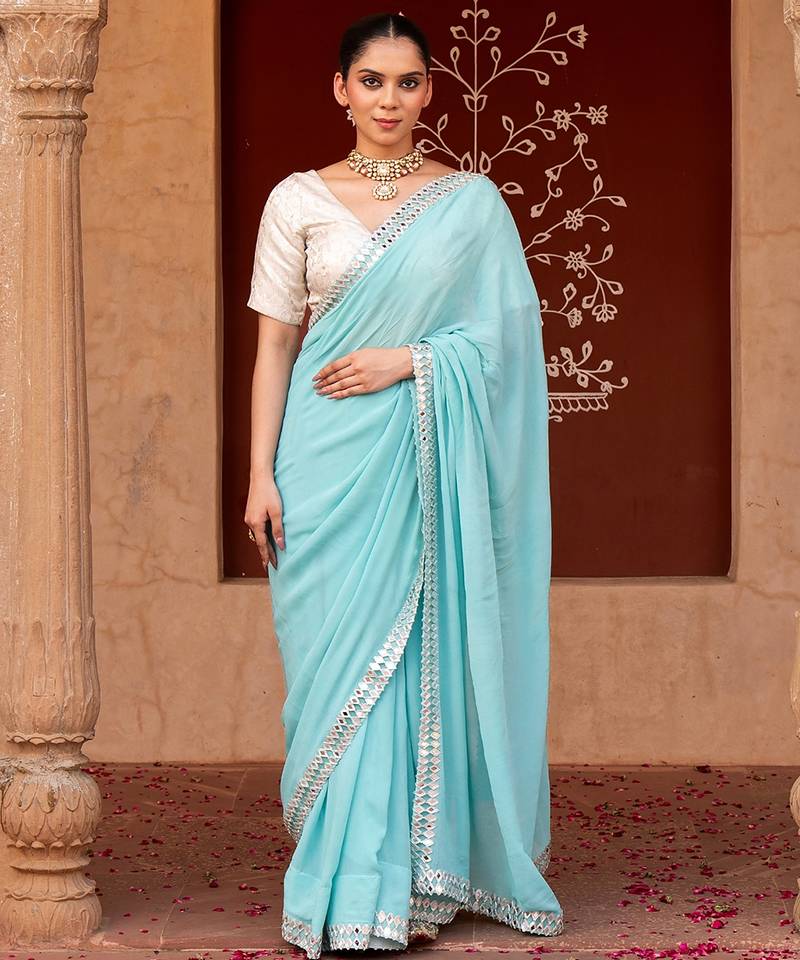 Sky blue embroidered pure georgette saree