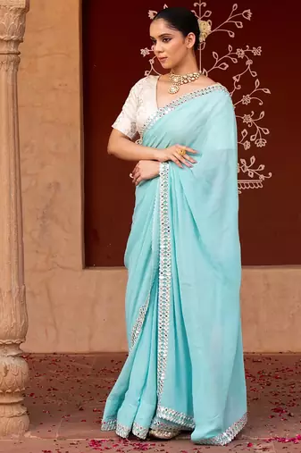 Sky blue embroidered pure georgette saree