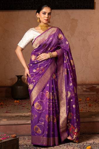 Purple embroidered pure tissue silk saree