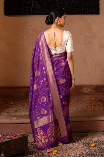 Purple embroidered pure tissue silk saree
