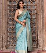 Powder blue embroidered pure katan silk saree