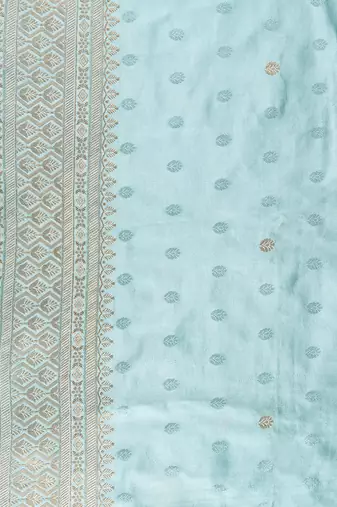 Powder blue embroidered pure katan silk saree