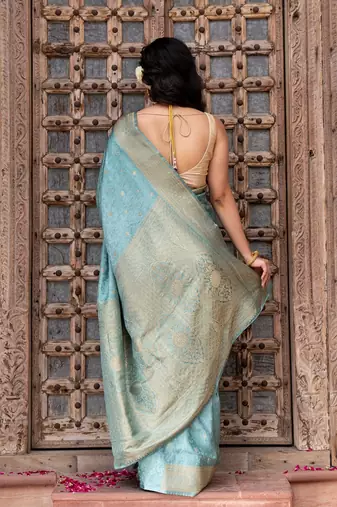 Powder blue embroidered pure katan silk saree