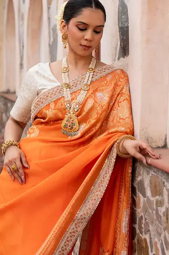 Orange embroidered pure katan silk saree