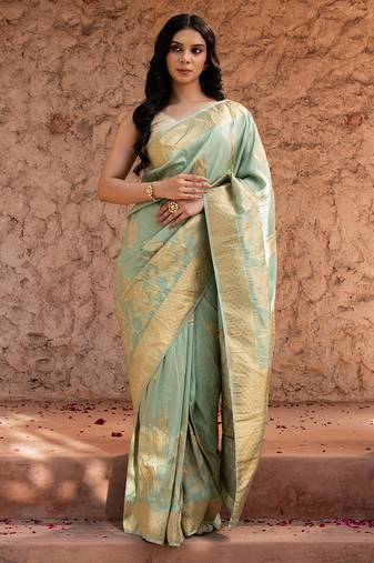 Sea green embroidered puure tissue saree