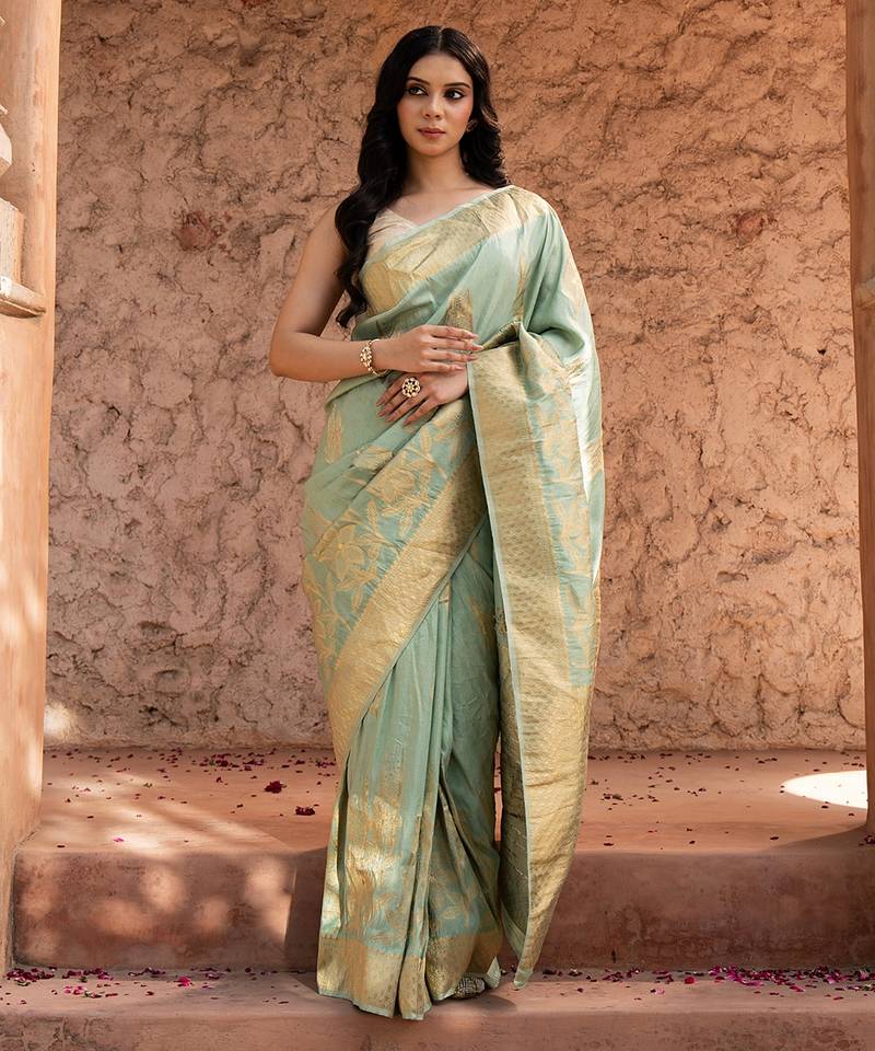 Sea green embroidered puure tissue saree