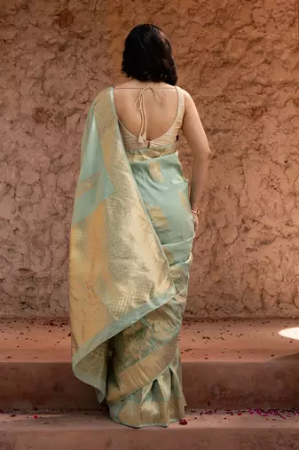 Sea green embroidered puure tissue saree