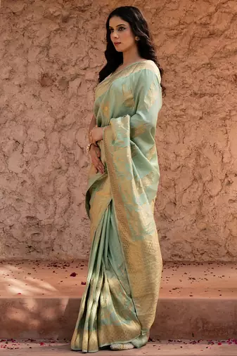 Sea green embroidered puure tissue saree