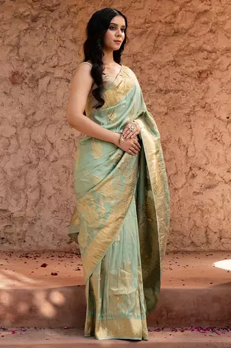 Sea green embroidered puure tissue saree