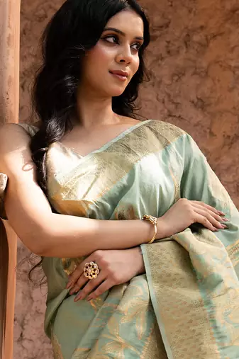 Sea green embroidered puure tissue saree