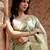 Sea green embroidered puure tissue saree