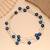 Blue color beaded mala with decorative bead pattern