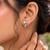 Silver color american diamond earrings with elegant finish