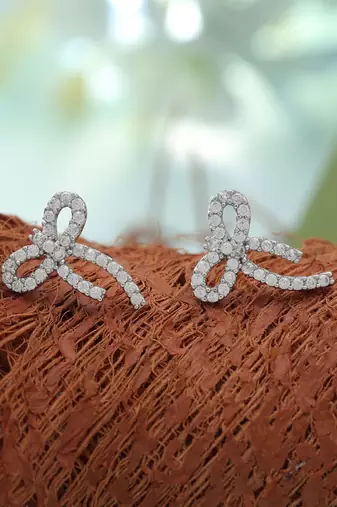 Silver color american diamond earrings with everyday style