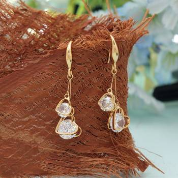 White color american diamond earrings with sparkling design 1