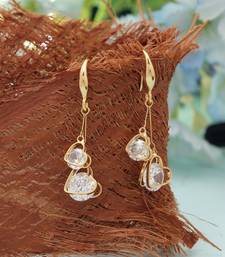 White color american diamond earrings with sparkling design