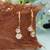 White color american diamond earrings with sparkling design