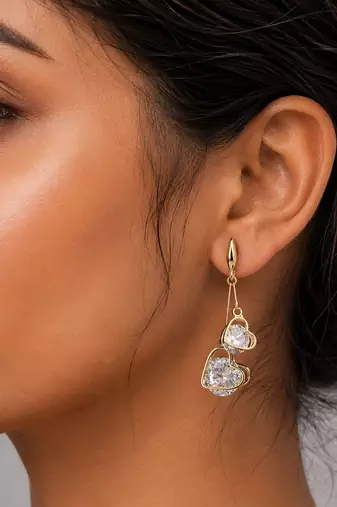 White color american diamond earrings with sparkling design
