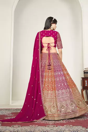 Rani Pink & Orange Embroidered Faux Georgette Lehenga Choli with Dupatta