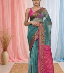 elegant teal and fuchsia resham saree with zari border