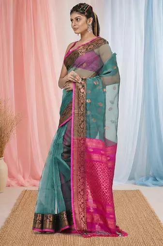 elegant teal and fuchsia resham saree with zari border