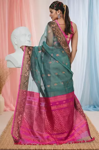 elegant teal and fuchsia resham saree with zari border