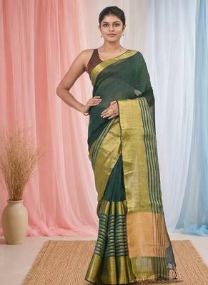 Elegant green and gold linen saree with striped borders 1