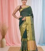 Elegant green and gold linen saree with striped borders
