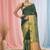 Elegant green and gold linen saree with striped borders