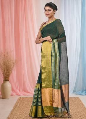 Elegant green and gold linen saree with striped borders 2