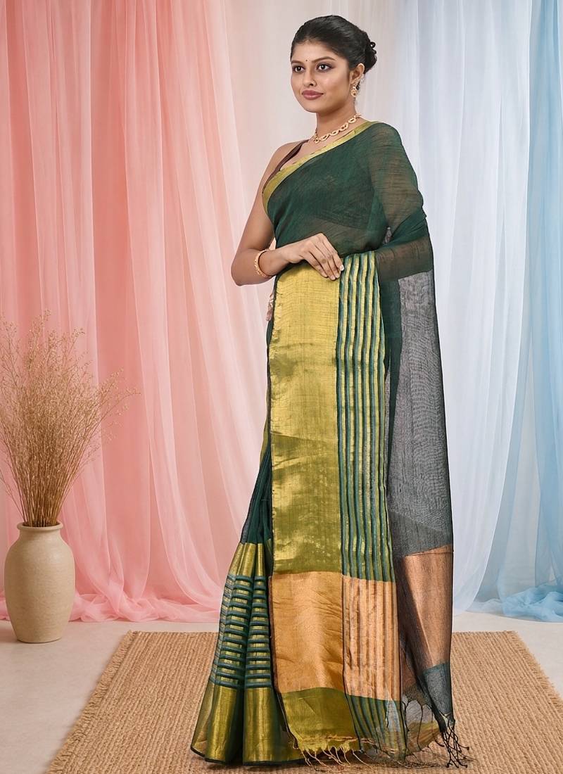 Elegant green and gold linen saree with striped borders