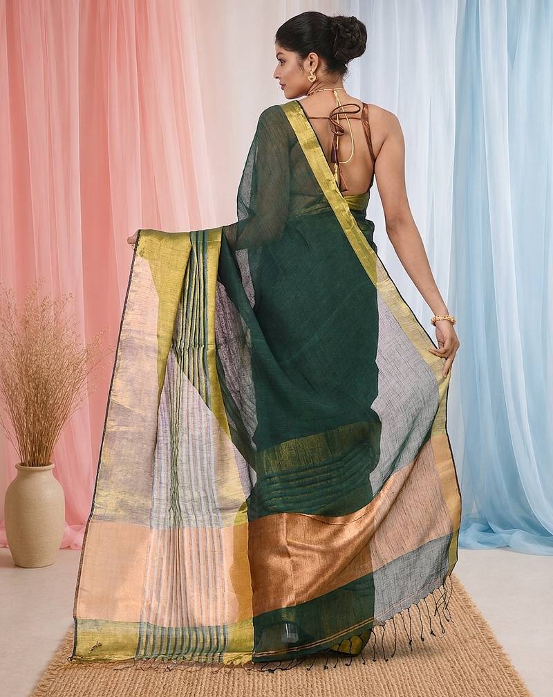 Elegant green and gold linen saree with striped borders
