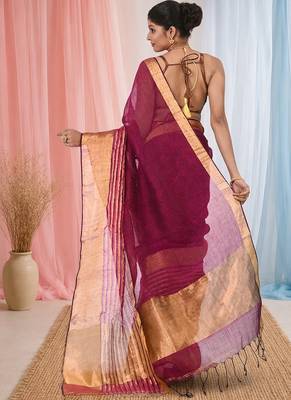 Elegant magenta and gold linen saree with striped borders 3