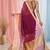 Elegant magenta and gold linen saree with striped borders