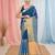 Elegant sapphire blue and gold linen saree with striped borders