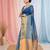 Elegant sapphire blue and gold linen saree with striped borders