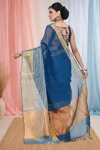 Elegant sapphire blue and gold linen saree with striped borders