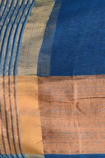 Elegant sapphire blue and gold linen saree with striped borders