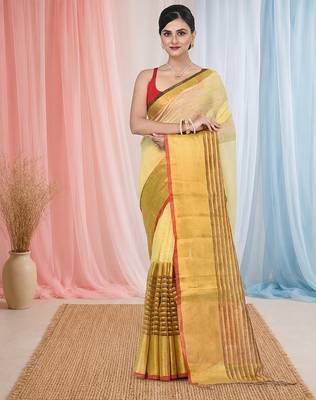 Elegant yellow and gold linen saree with striped borders 1