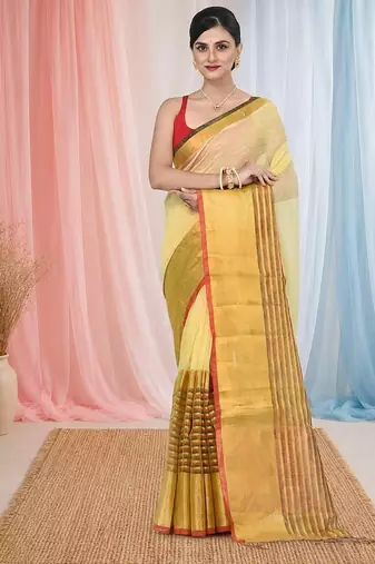 Elegant yellow and gold linen saree with striped borders