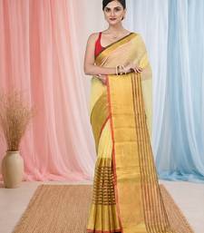 Elegant yellow and gold linen saree with striped borders