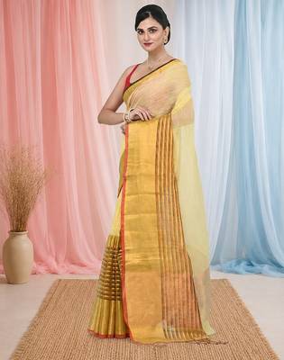 Elegant yellow and gold linen saree with striped borders 2