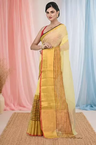 Elegant yellow and gold linen saree with striped borders