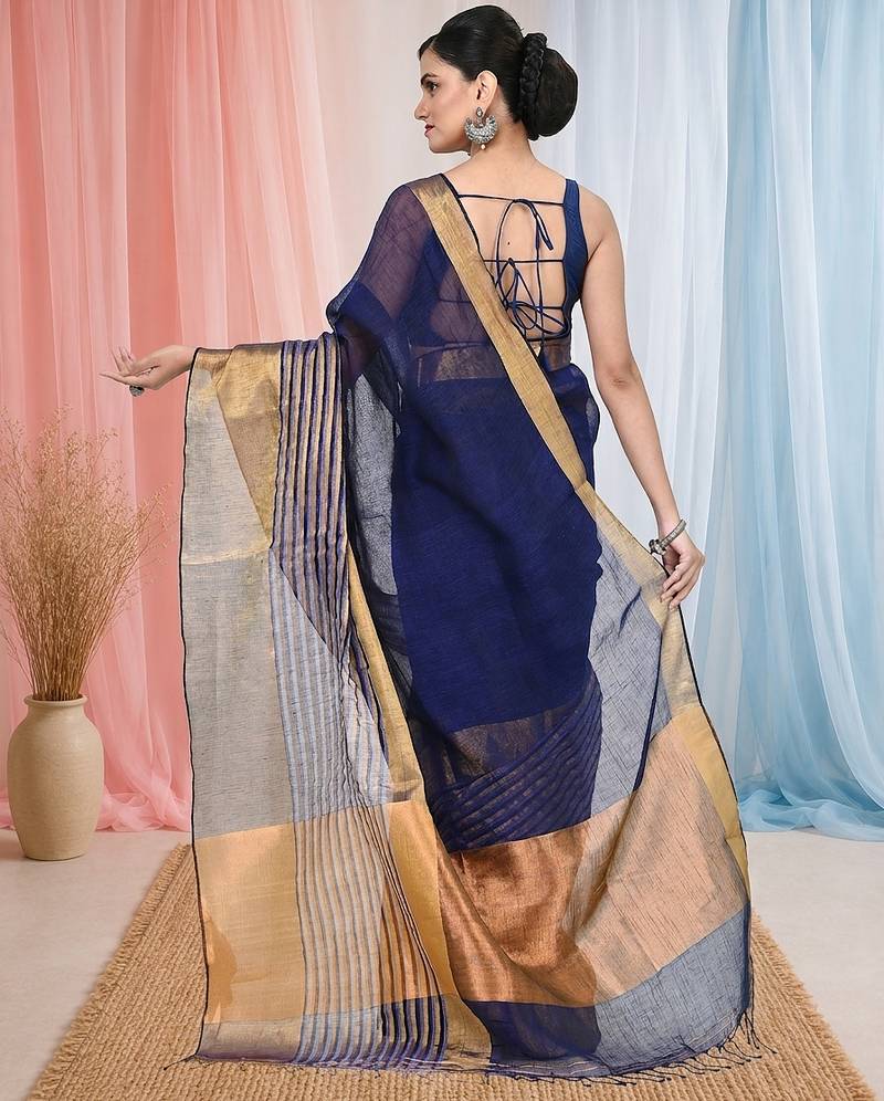 Elegant blue and gold linen saree with striped borders