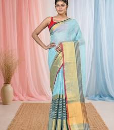 Elegant sky blue and gold linen saree with striped borders