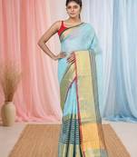 Elegant sky blue and gold linen saree with striped borders
