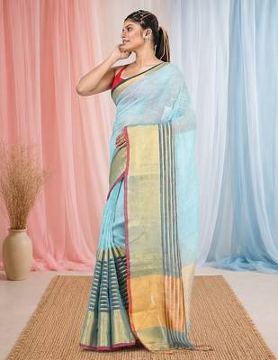 Elegant sky blue and gold linen saree with striped borders 2
