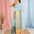 Elegant sky blue and gold linen saree with striped borders