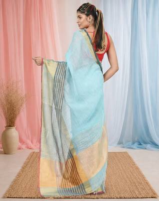 Elegant sky blue and gold linen saree with striped borders 3