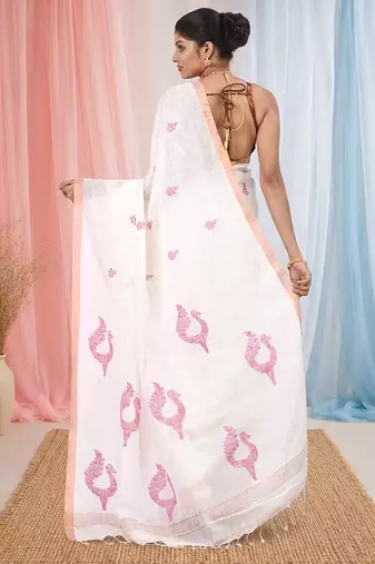 White linen saree with pink bird & texture motifs and zari borders